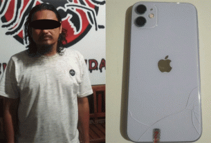 IS dengan iPhone 11 milik pengunjung Tepian Mahakam yang ditemukan dalam penguasaannya. (foto : Exclusive)
